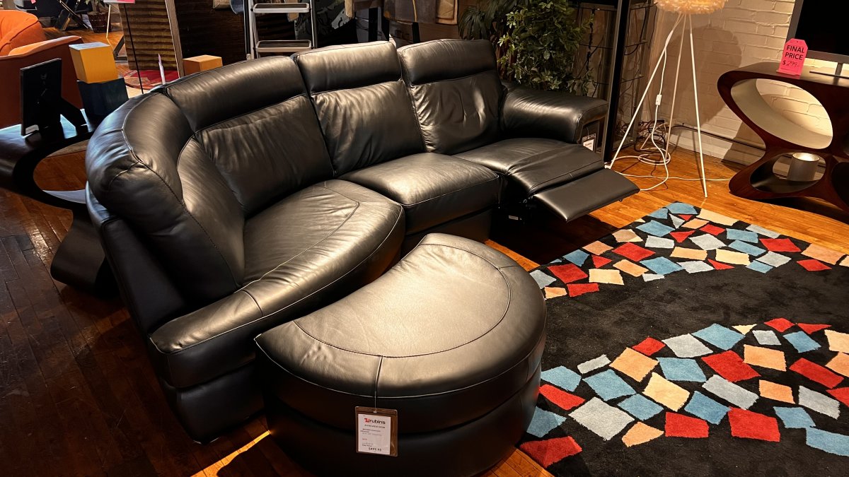 Natuzzi Editions Brivado Leather Sectional with End Power Recliner and Ottoman.